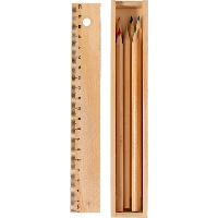 Crayons et règle dans une boîte en bois